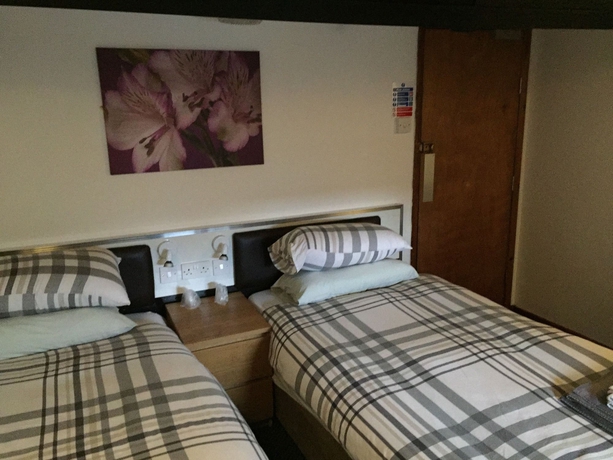 Imagen de la habitación del The Brighton. Foto 9