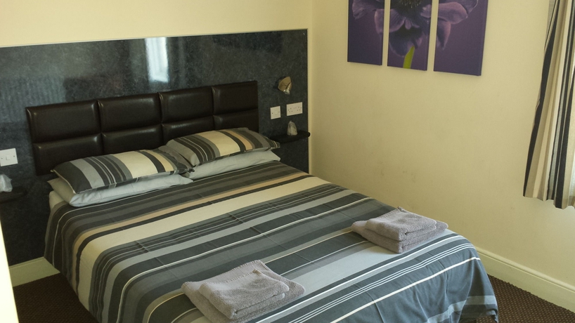 Imagen de la habitación del The Brighton. Foto 13