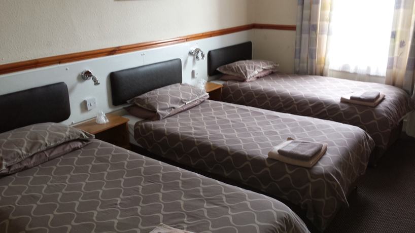 Imagen de la habitación del The Brighton. Foto 16