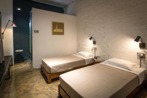 Imagen de la habitación del The Brownstone Hostel & Space. Foto 6