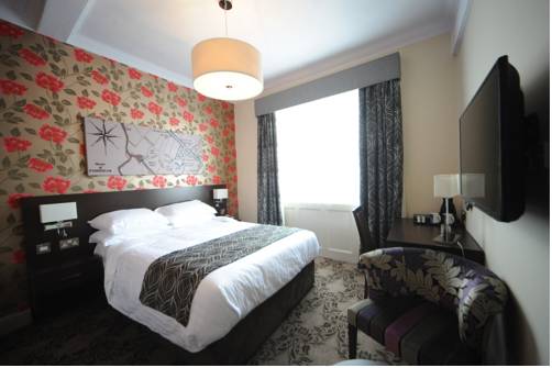 Imagen de la habitación del The Bull Hotel. Foto 10