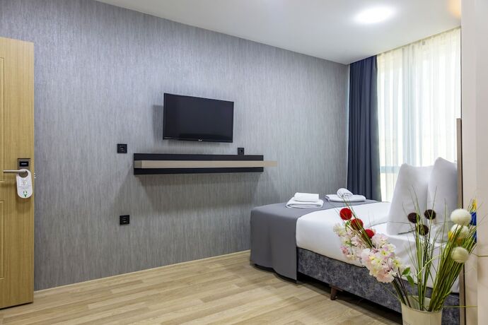 Imagen de la habitación del The Business Class Hotel. Foto 13