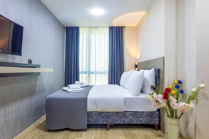 Imagen de la habitación del The Business Class Hotel. Foto 15