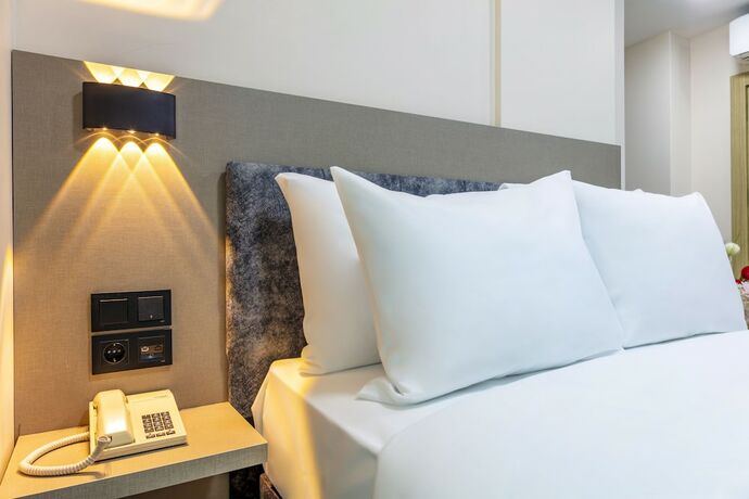 Imagen de la habitación del The Business Class Hotel. Foto 16