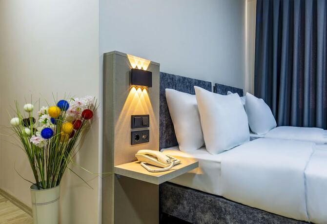 Imagen de la habitación del The Business Class Hotel. Foto 17