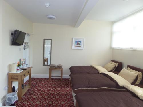 Imagen de la habitación del The Cabbage Hall Hotel. Foto 7