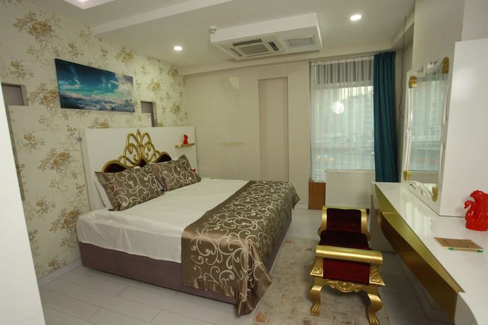 Imagen de la habitación del The City Walls Suit Hotel. Foto 16
