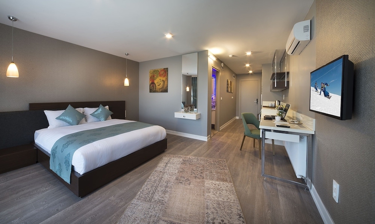 Imagen de la habitación del The Clock Suites. Foto 3
