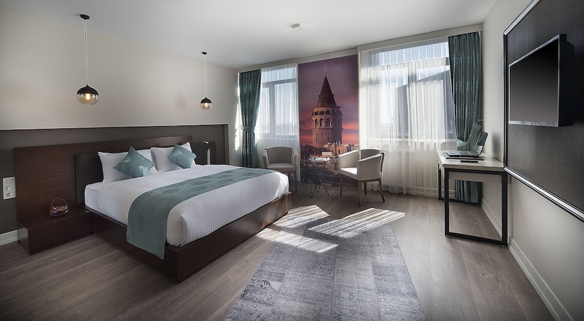 Imagen de la habitación del The Clock Suites. Foto 4