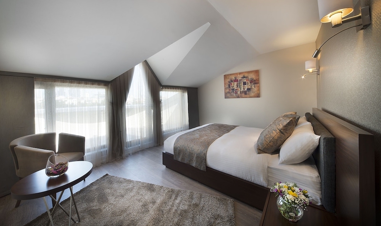 Imagen de la habitación del The Clock Suites. Foto 6