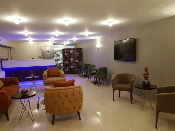 Imagen de los interiores del The Clock Suites. Foto 18