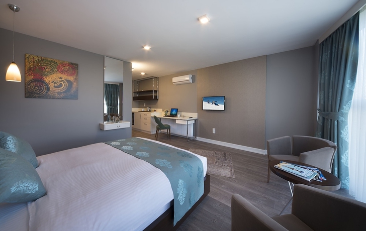 Imagen de la habitación del The Clock Suites. Foto 11