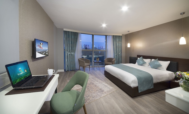 Imagen de la habitación del The Clock Suites. Foto 15