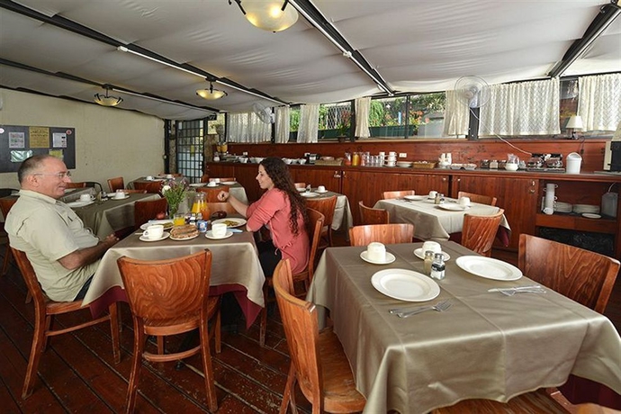 Imagen de la habitación del The Colony Hotel. Foto 5