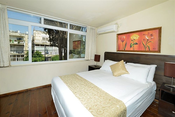 Imagen de la habitación del The Colony Hotel. Foto 7
