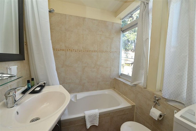 Imagen de la habitación del The Colony Hotel. Foto 8