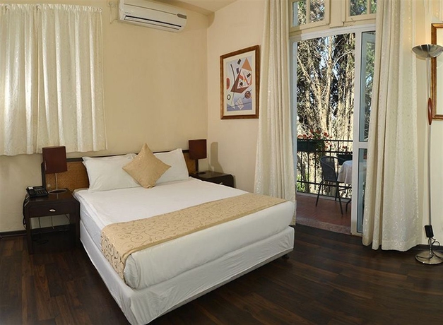 Imagen de la habitación del The Colony Hotel. Foto 11