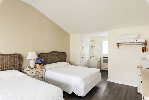 Imagen de la habitación del The Commodore Inn, By The Beach. Foto 1