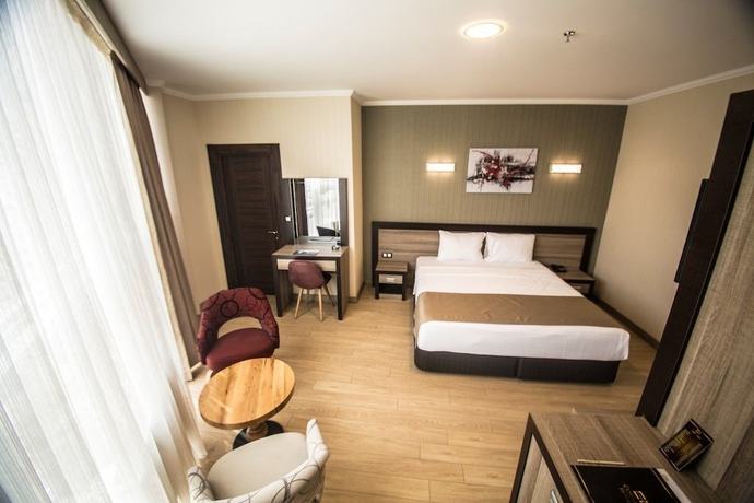 Imagen de la habitación del The Corner Hotel, Sincan. Foto 3