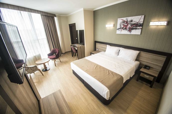 Imagen de la habitación del The Corner Hotel, Sincan. Foto 4