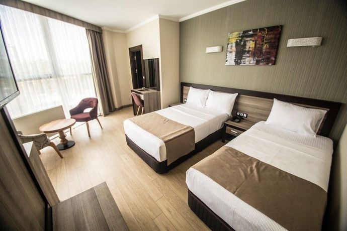 Imagen de la habitación del The Corner Hotel, Sincan. Foto 5