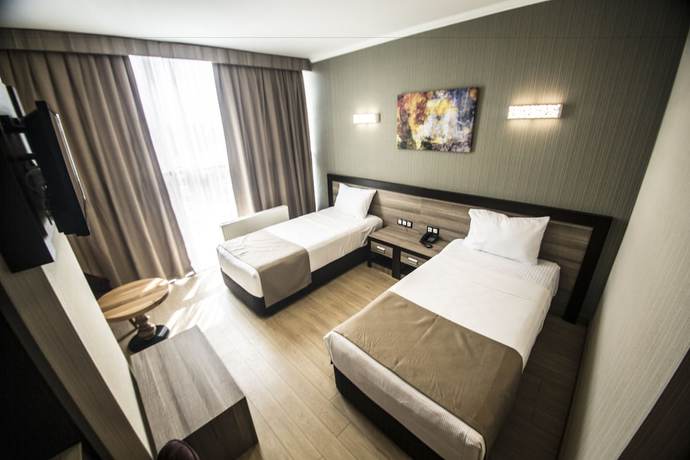 Imagen de la habitación del The Corner Hotel, Sincan. Foto 6