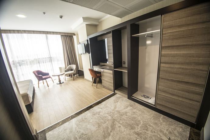 Imagen de la habitación del The Corner Hotel, Sincan. Foto 7
