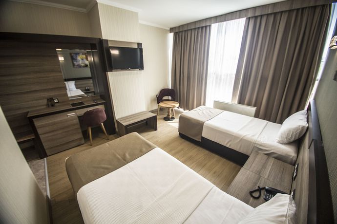 Imagen de la habitación del The Corner Hotel, Sincan. Foto 12