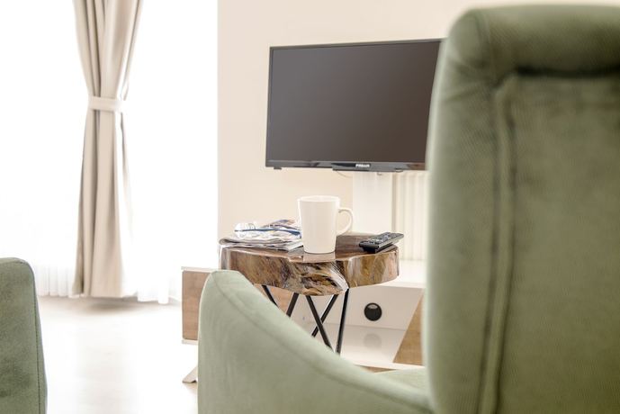 Imagen de la habitación del The Corner Inn Hotel Suit. Foto 4