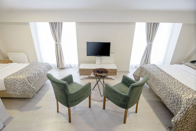 Imagen de la habitación del The Corner Inn Hotel Suit. Foto 6