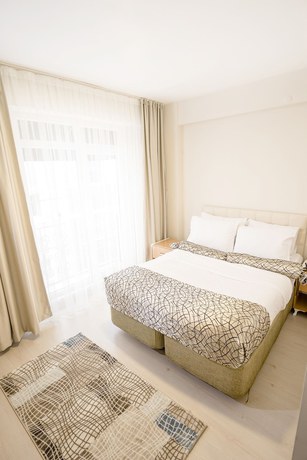 Imagen de la habitación del The Corner Inn Hotel Suit. Foto 9