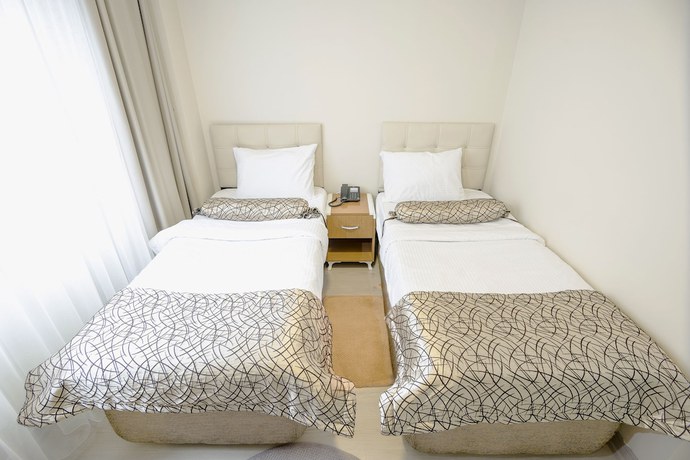 Imagen de la habitación del The Corner Inn Hotel Suit. Foto 11