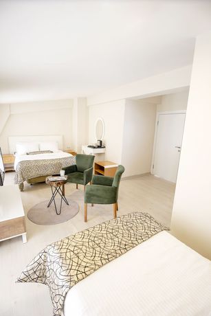 Imagen de la habitación del The Corner Inn Hotel Suit. Foto 12