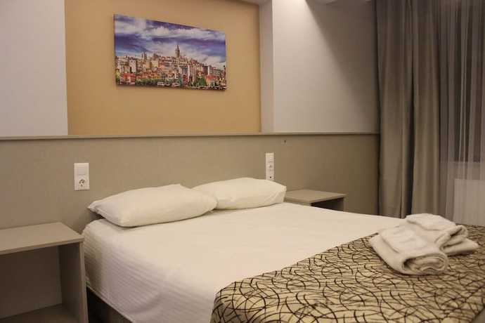 Imagen de la habitación del The Corner Inn Hotel Suit. Foto 14