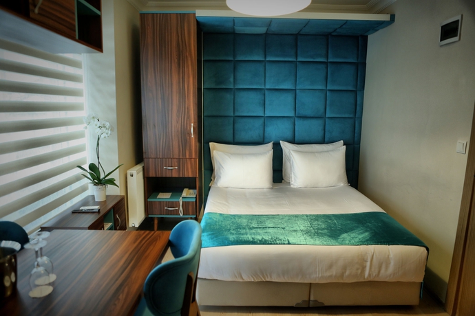 Imagen de la habitación del The Corner Palace. Foto 7