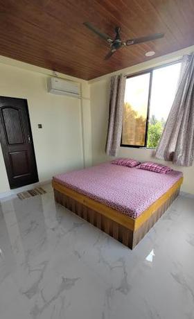 Imagen de la habitación del The Exotic Farmhouse Nala Sopara. Foto 11