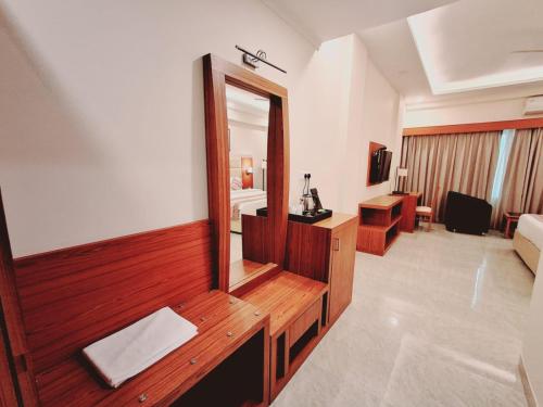 Imagen de la habitación del The Fern Residency, Bodhgaya. Foto 19