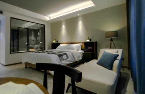 Imagen de la habitación del The Flowers&pots Hotel. Foto 8