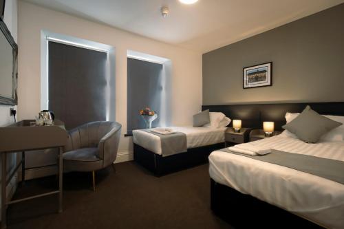 Imagen de la habitación del The Friendship Hotel. Foto 15