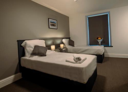 Imagen de la habitación del The Friendship Hotel. Foto 16