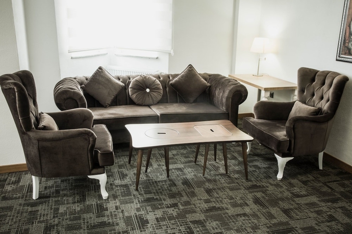 Imagen de la habitación del The Garden Otel. Foto 3