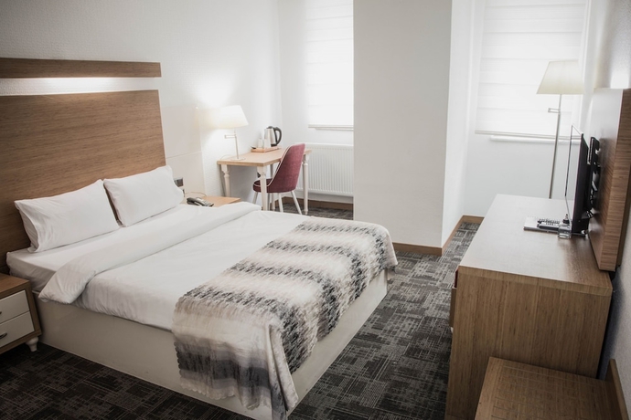 Imagen de la habitación del The Garden Otel. Foto 4