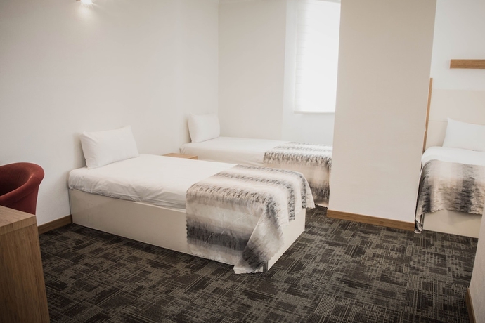 Imagen de la habitación del The Garden Otel. Foto 6