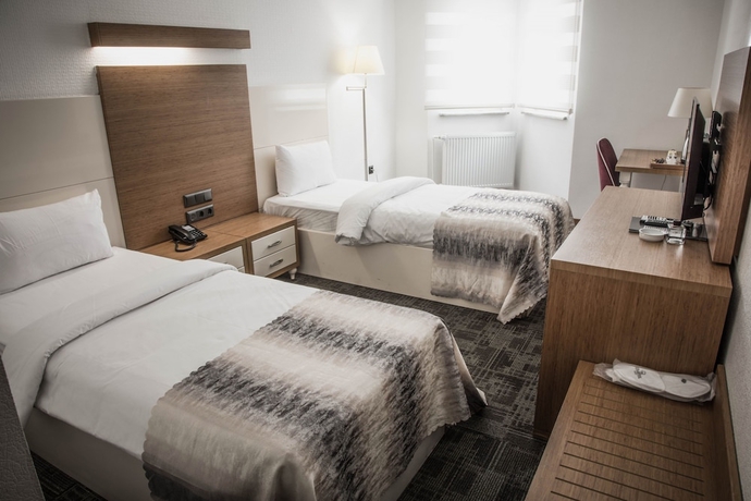 Imagen de la habitación del The Garden Otel. Foto 8