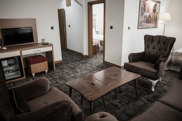 Imagen de la habitación del The Garden Otel. Foto 11