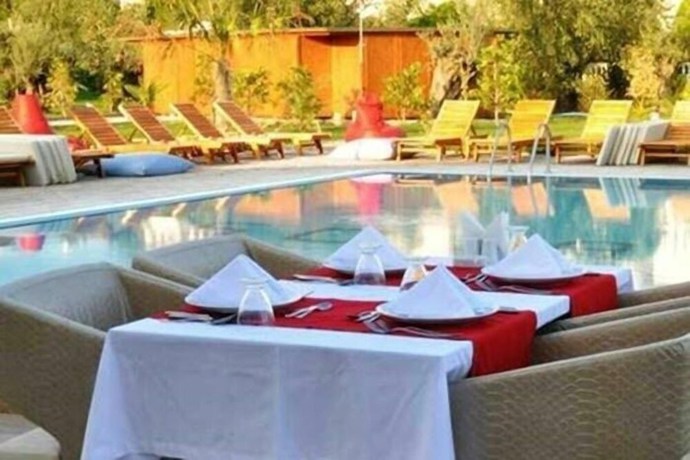 Imagen del bar/restaurante del The Green Beach Resort Hotel. Foto 4