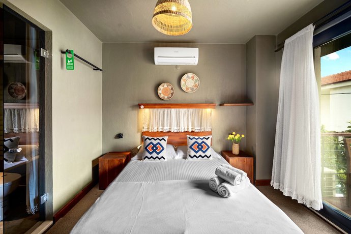 Imagen de la habitación del The Green Goose Hotel. Foto 7