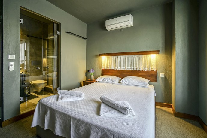 Imagen de la habitación del The Green Goose Hotel. Foto 8