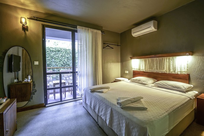 Imagen de la habitación del The Green Goose Hotel. Foto 11