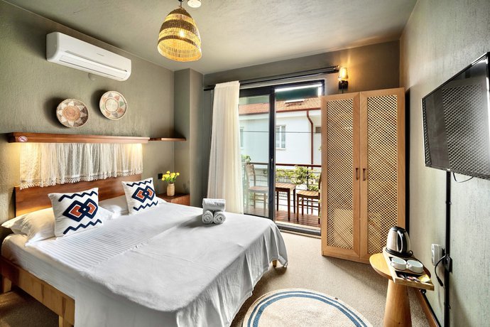 Imagen de la habitación del The Green Goose Hotel. Foto 16
